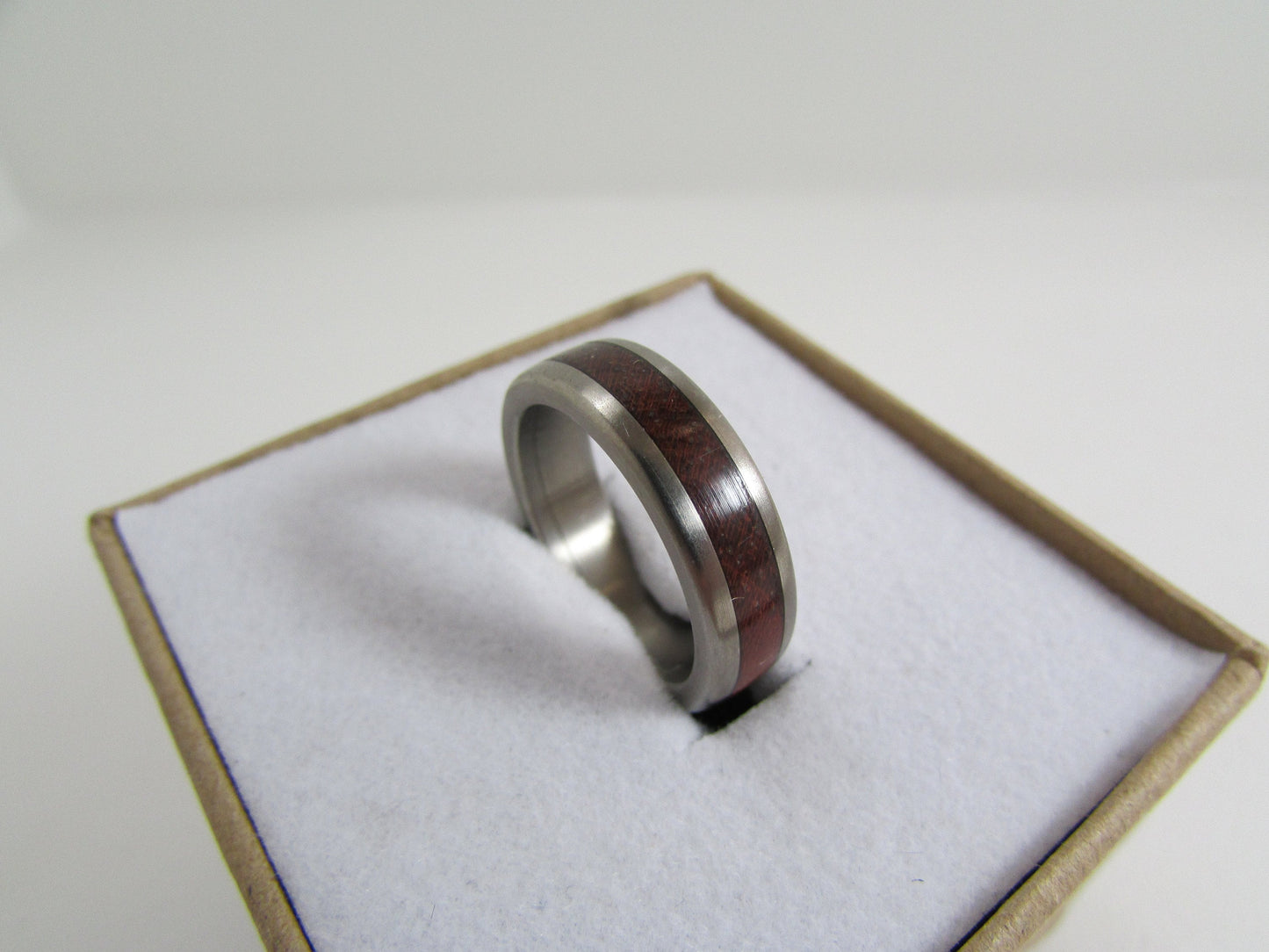 Bubinga wood ring with Titanium core.