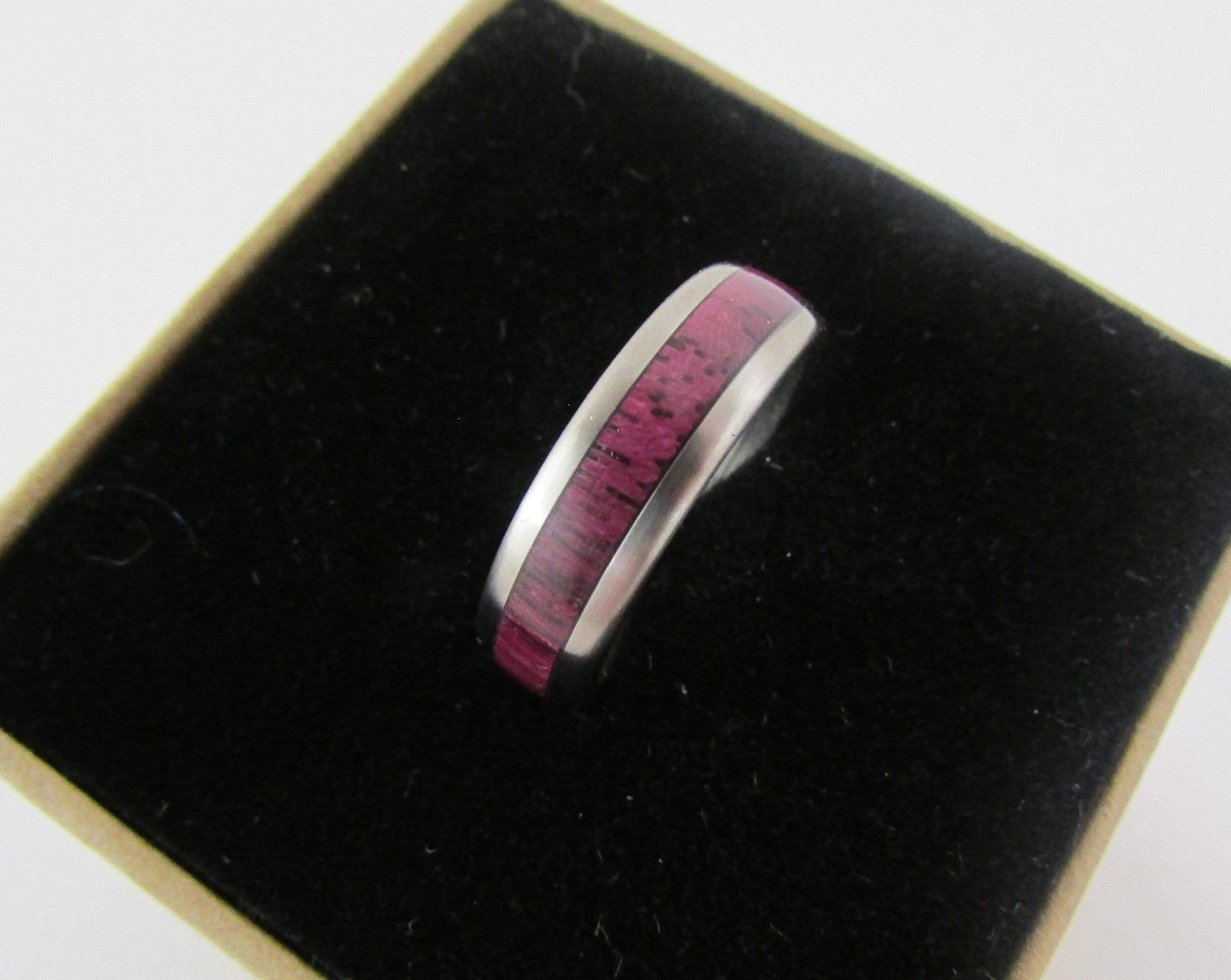 Wooden ring in Purple heart and Titanium.