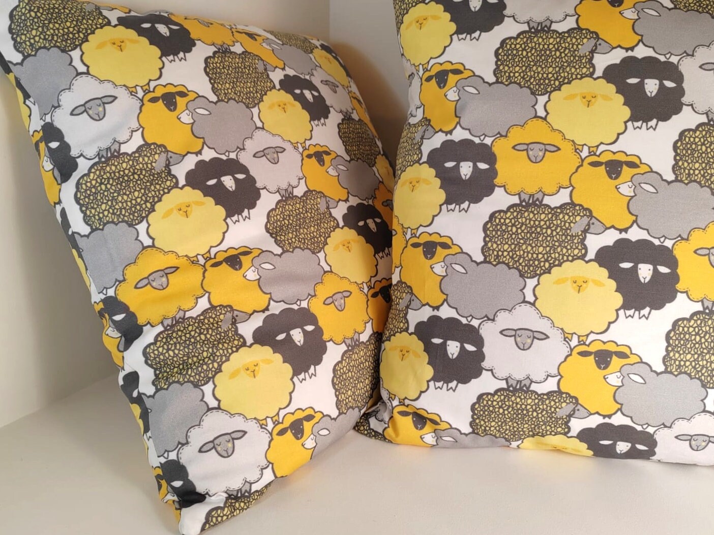 Sheep cushion in yellow and grey